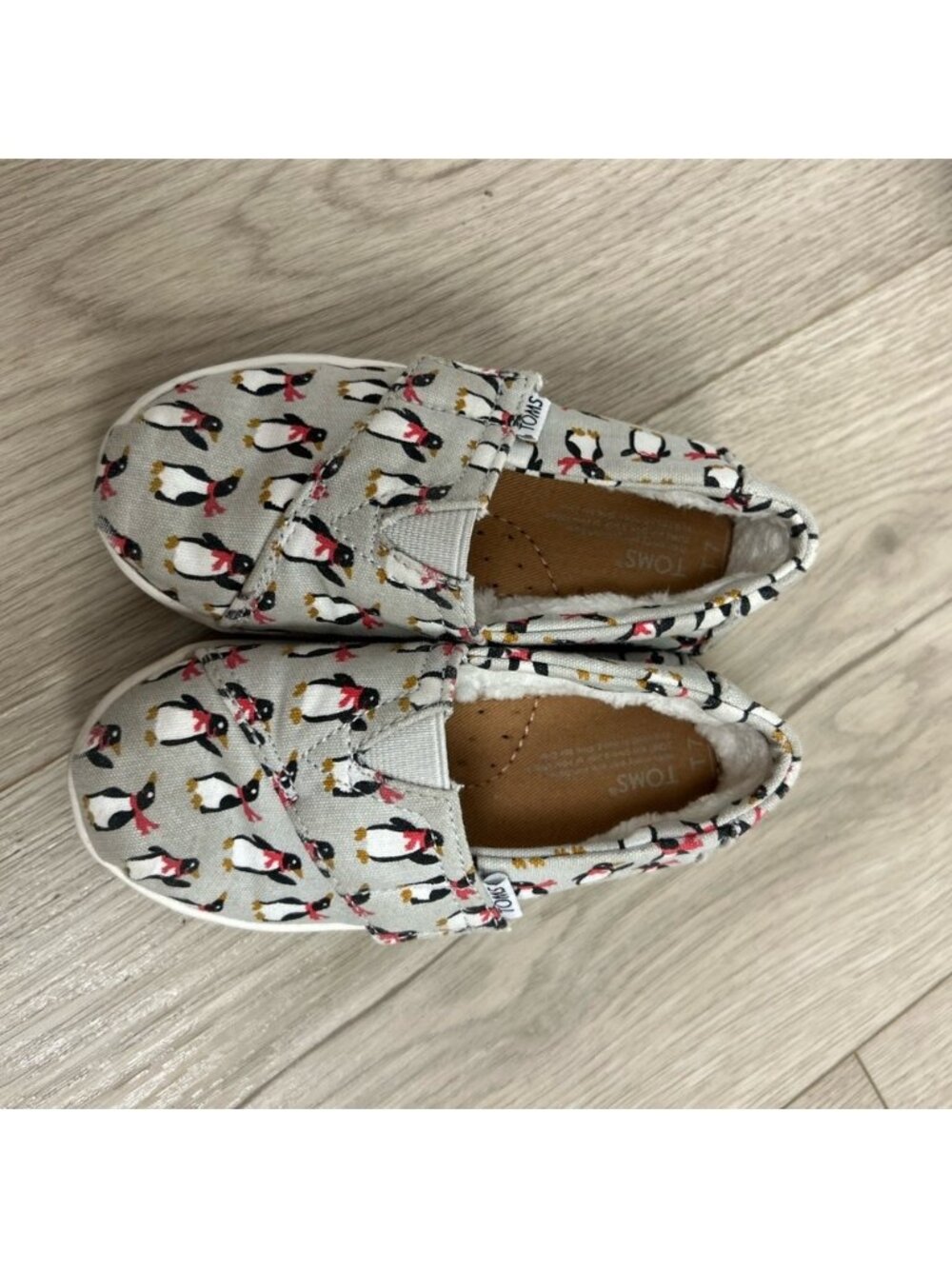 Tom’s Classic Frost Holiday Penguin Slip-On Flats